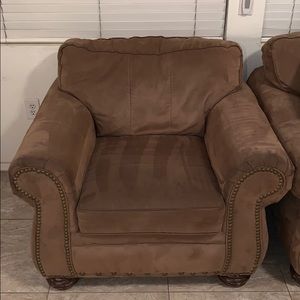 Brown couch with chair and ottoman